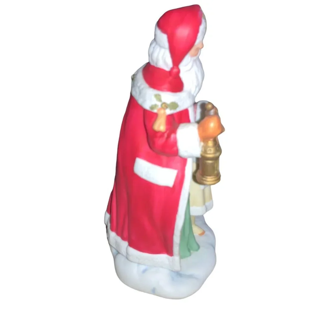 Avon 1995 Ceramic Santa with Child Figurine